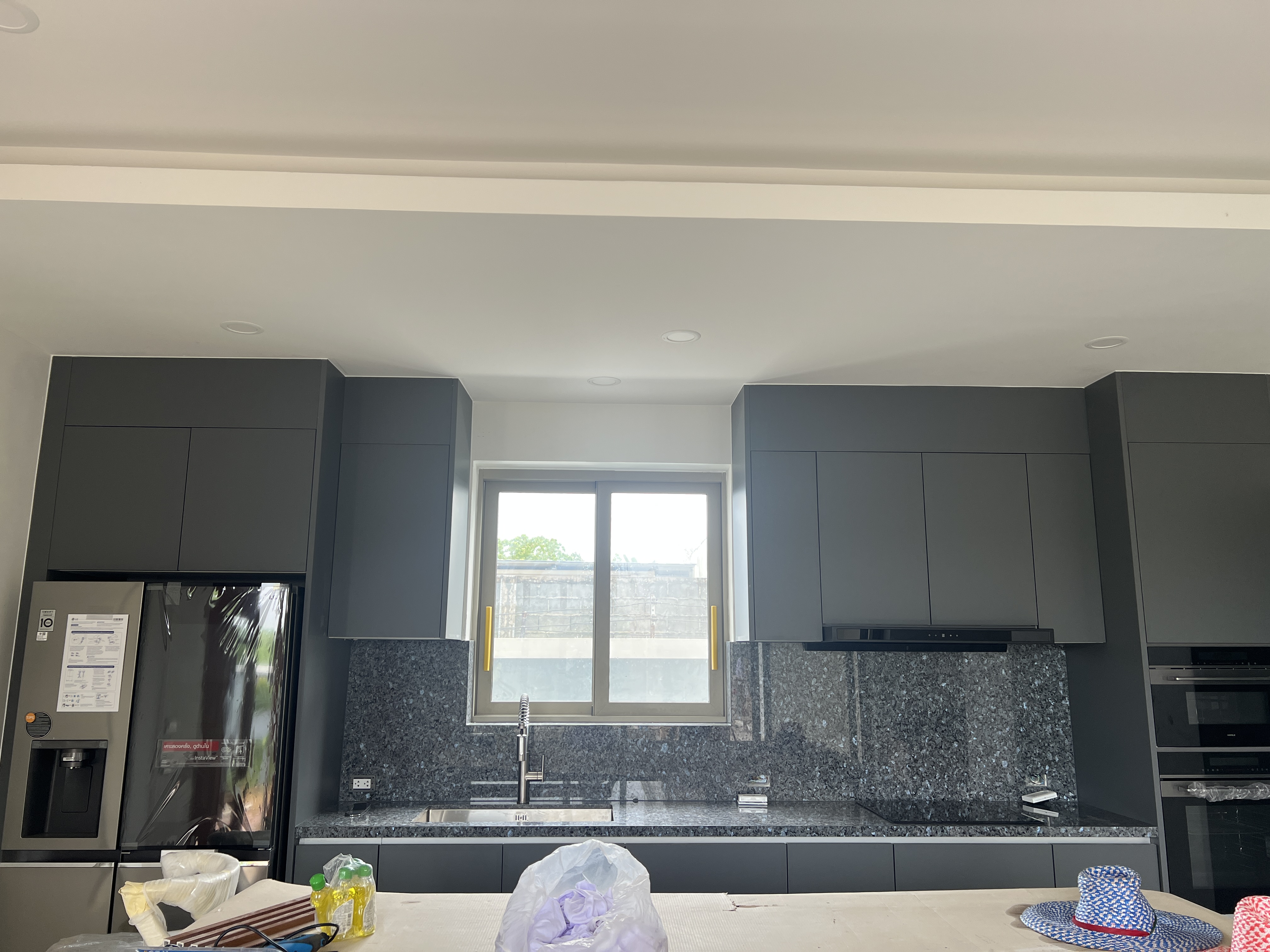 Designer kitchen with stone worktops and integrated appliances
